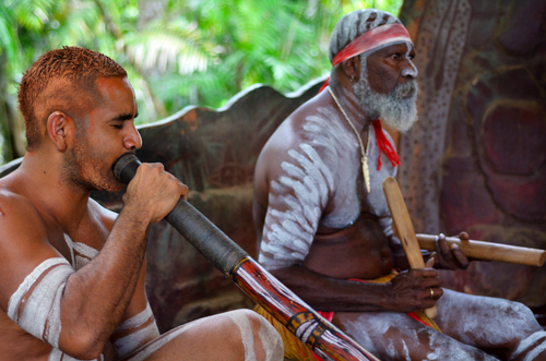 Australian,aboriginal,men,play,aboriginal,music,on,didgeridoo,and,wooden